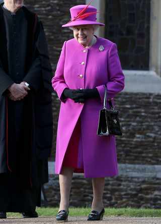 Queen Elizabeth II attends a Christmas Day church service at Sandringham on December 25, 2014 in King's Lynn, England