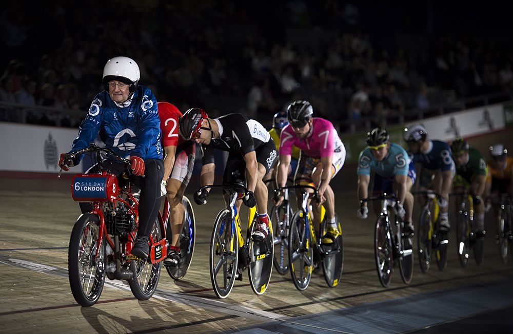Riders fight for position behind the derny in the keirin heat
