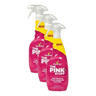 Three spray bottles of pink stuff