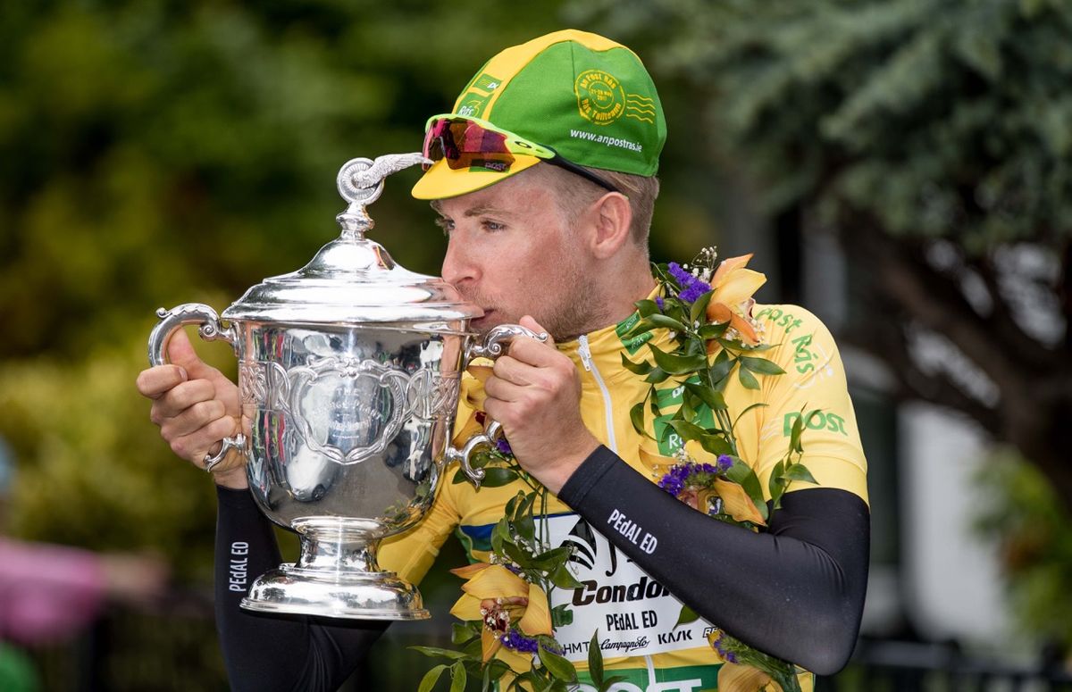 James Gullen kisses the trophy