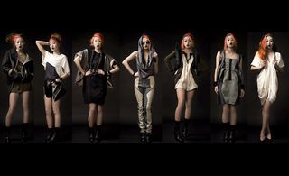 A collection of seven models wearing different black, white and grey outfits.