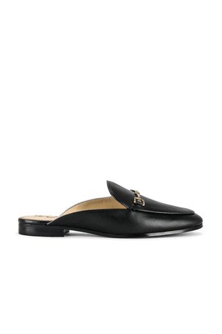 black loafers with gold buckle