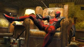 Deadpool leaned back in a chair in a dingy apartment.