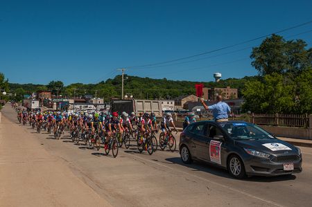 The men's field is under neutral as they leave Cannon Falls