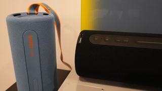Two speakers sit side by side