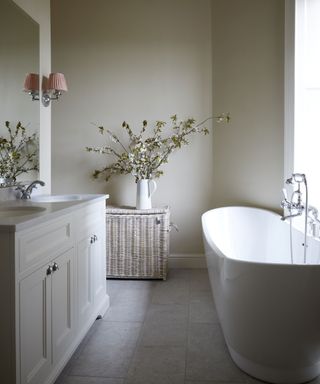 neutral bathroom with modern freestanding bath in Edinburgh Georgian townhouse designed by Jessica Buckley