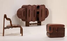 View of three pieces of furniture made of wood by Peter Mabeo for Fendi: a chair, a cabinet and a double stool