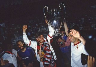 Zvonimir Boban and Dejan Savicevic of AC Milan lift the trophy after winnign the Champions League Final match between AC Milan and Barcelona at Stadio Olimpico