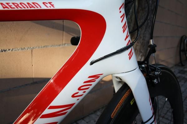Canyon fits its latest Aeroad CF frame with internal routing throughout.
