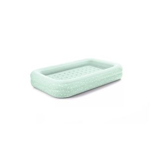 A pale green inflatable childrens air bed with raised sides