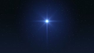 A bright star twinkles in a deep blue night sky