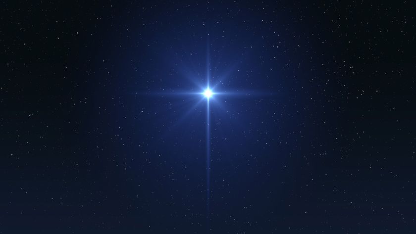 A bright star twinkles in a deep blue night sky