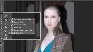 Photoshop screenshot of Red Eye Tool removing red-eye effect