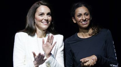 Britain's Catherine, Princess of Wales (L) stands with Captain Preet Chandi during a visit to Landau Forte College in Derby, central England on February 8, 2023, to celebrate Chandi's return from her solo expedition across Antarctica. - Captain Chandi surpassed the previous world record of 907 miles set by fellow soldier Henry Worsley, in 2015. 