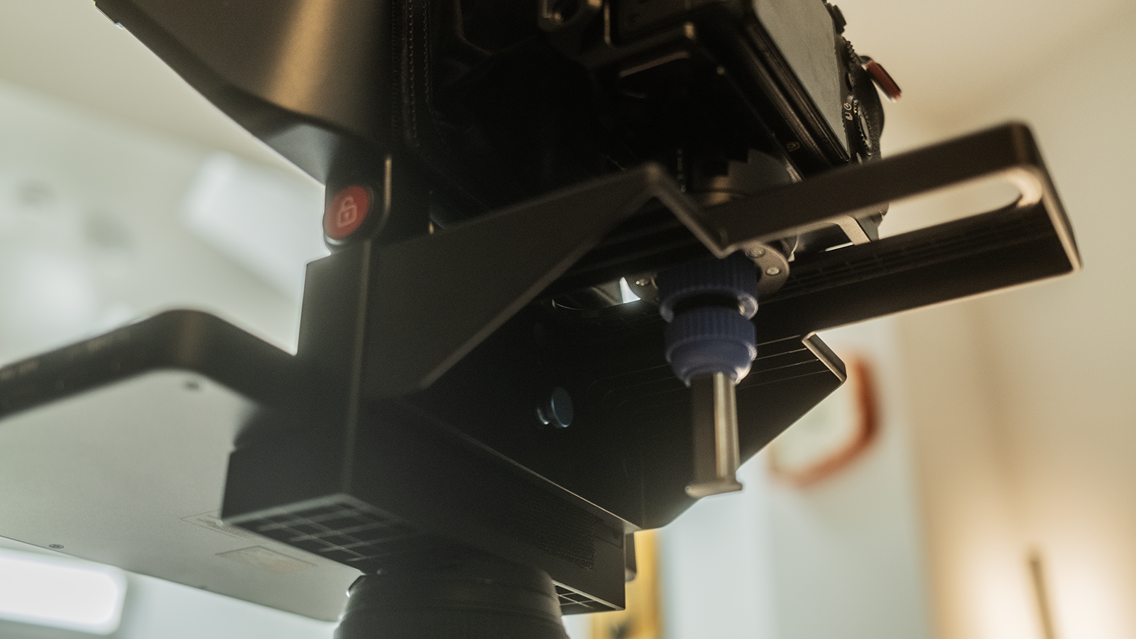 An X11 teleprompter on a tripod