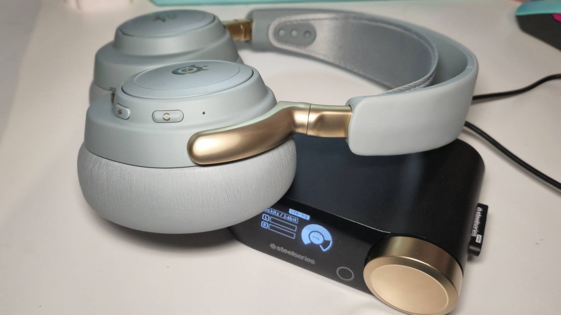 Photo showing the SteelSeries Arctis Nova Elite headset sitting on the Game Hub.