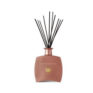 Pink rituals cotton blossom reed diffuser with black reeds and gold detailing