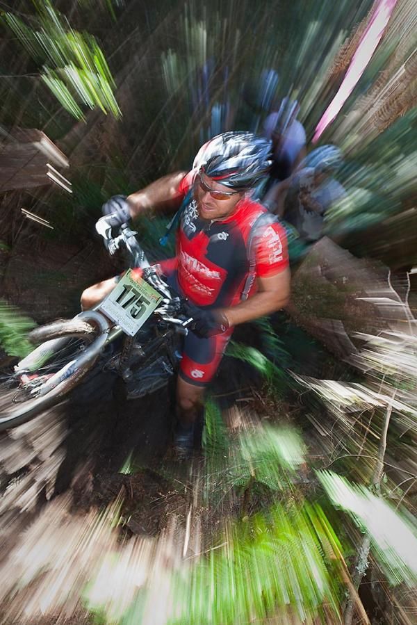 Victorian Andrew Spencer scrambles through a rainforest singletrack section near Que River.