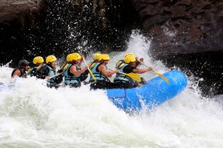 A group of rafters in the rapids on the Gauley River