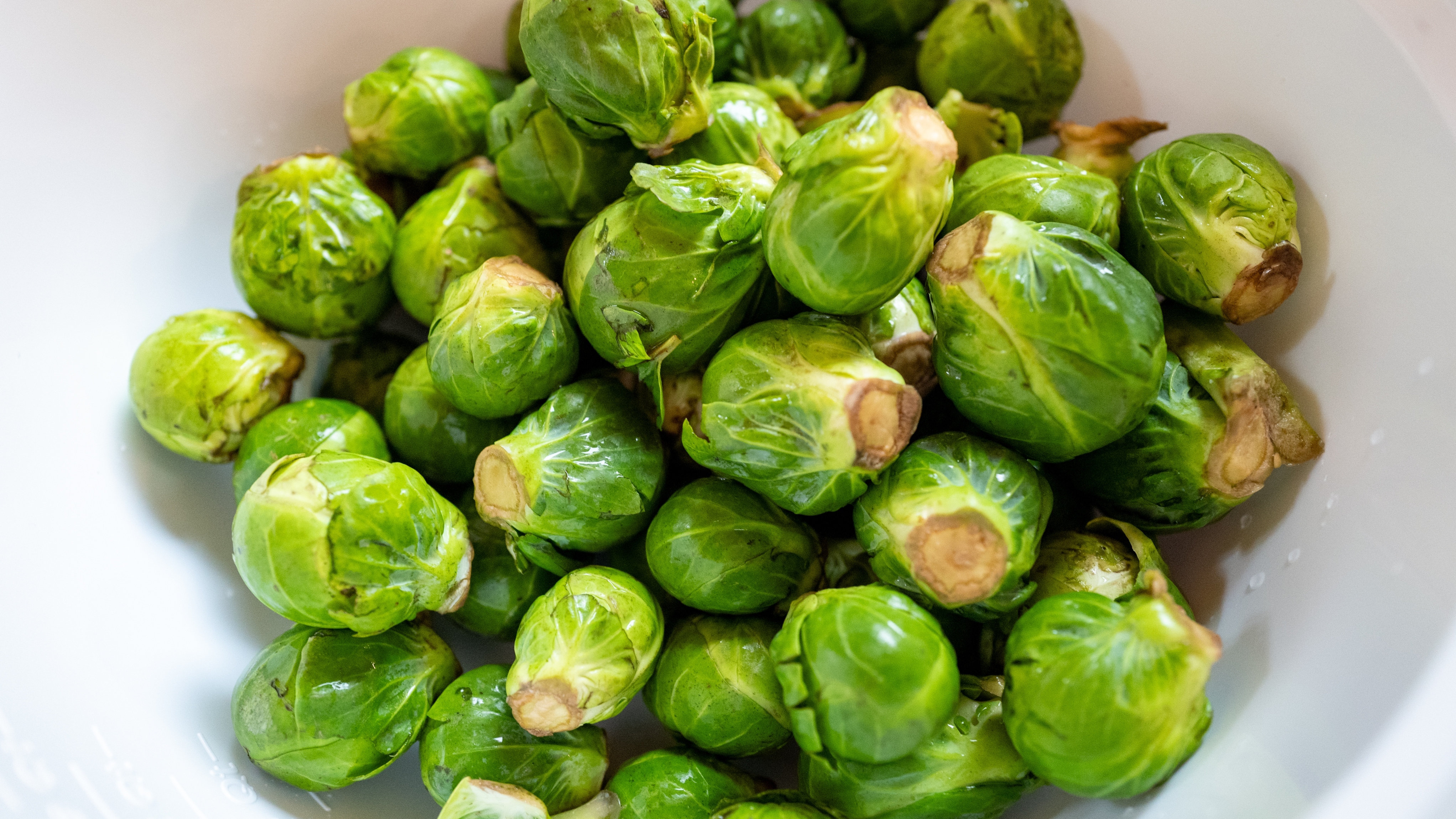 Close-up of raw brussels sprouts in a white bowl, Lafayette, California, November 16, 2025