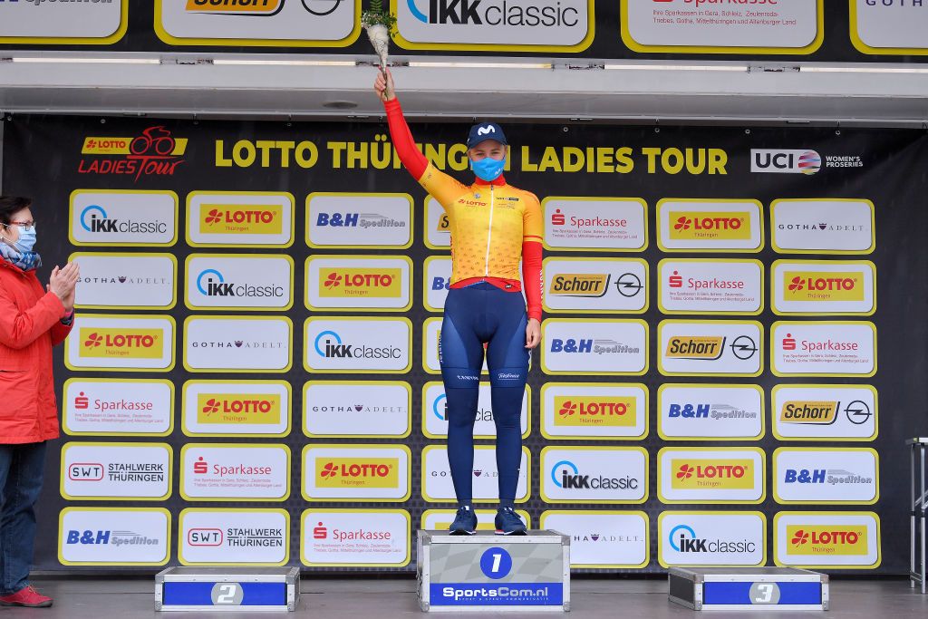 GERA GERMANY MAY 26 Emma Norsgaard Jorgensen of Denmark and Movistar Team yellow leader jersey celebrates at podium during the 34th Internationale LOTTO Thringen Ladies Tour 2021 Stage 2 a 1251km stage from Gera to Gera Mask Covid safety measures ltlt2021 lottothueringenladiestour womencycling on May 26 2021 in Gera Germany Photo by Luc ClaessenGetty Images