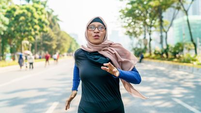 Woman going for a run as part of a 10k training plan