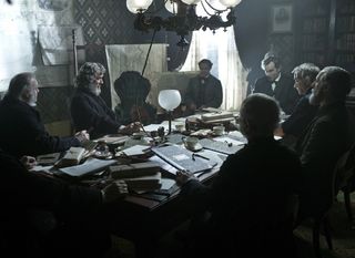 LINCOLN - President Lincoln (Daniel Day-Lewis, far right) meets with his Cabinet