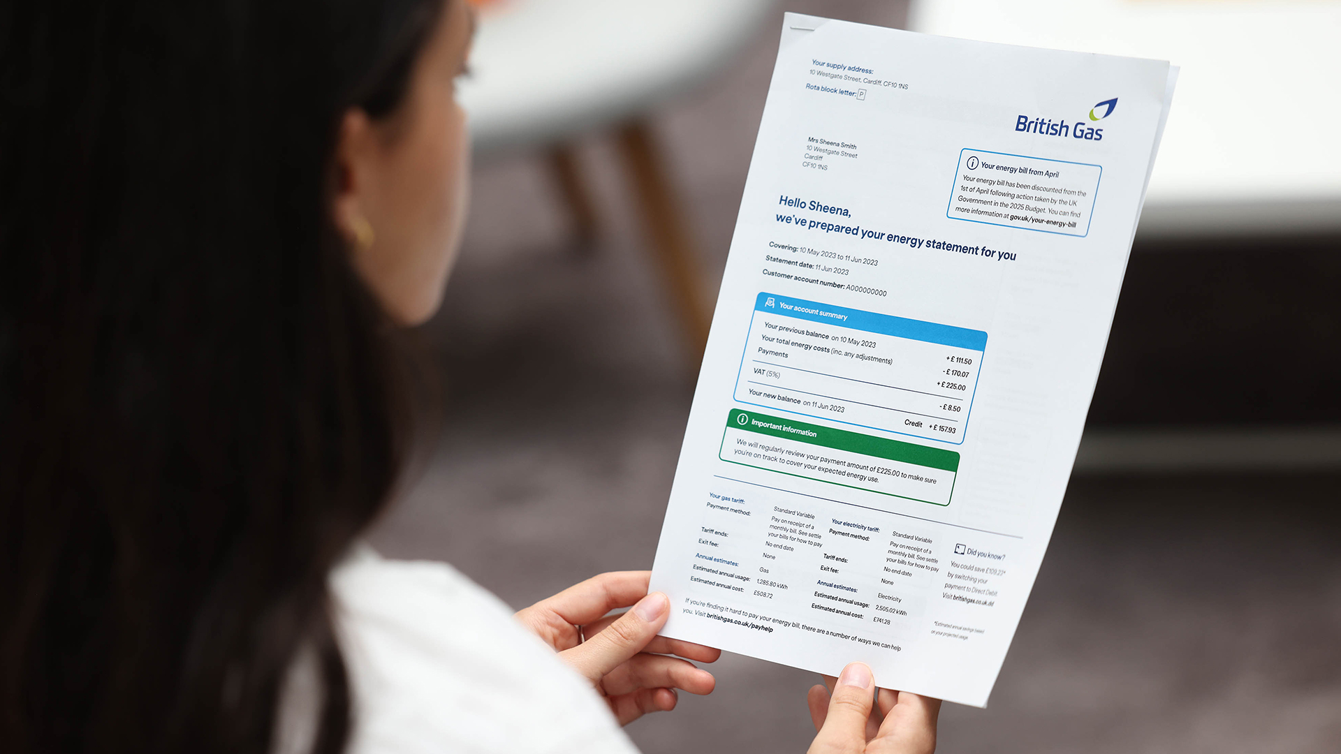 person reading a British Gas bill