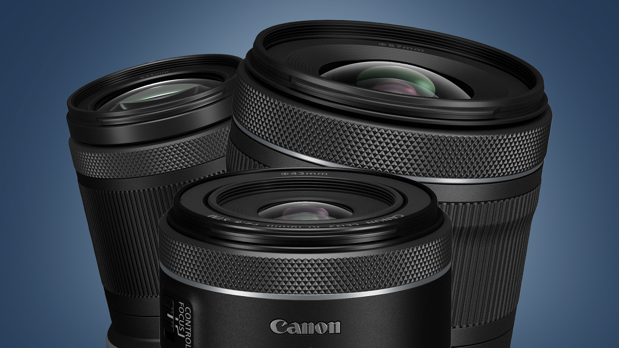 Three Canon lenses on a blue background