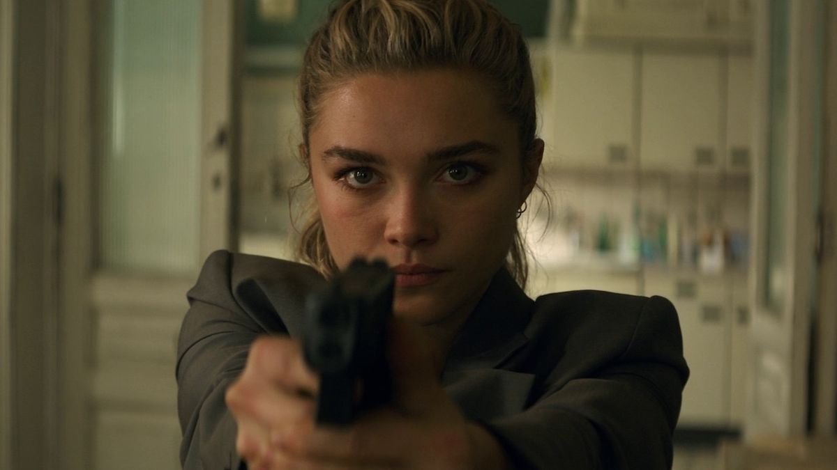 Florence Pugh's Yelena Belova hold gun in Black Widow movie.