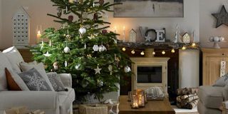 christmas tree living room with christmas bubbles and gifts