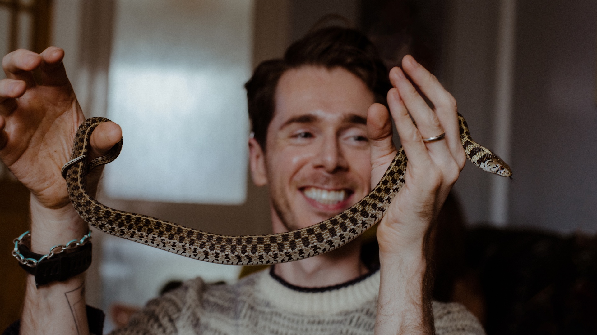 Man with pet snake