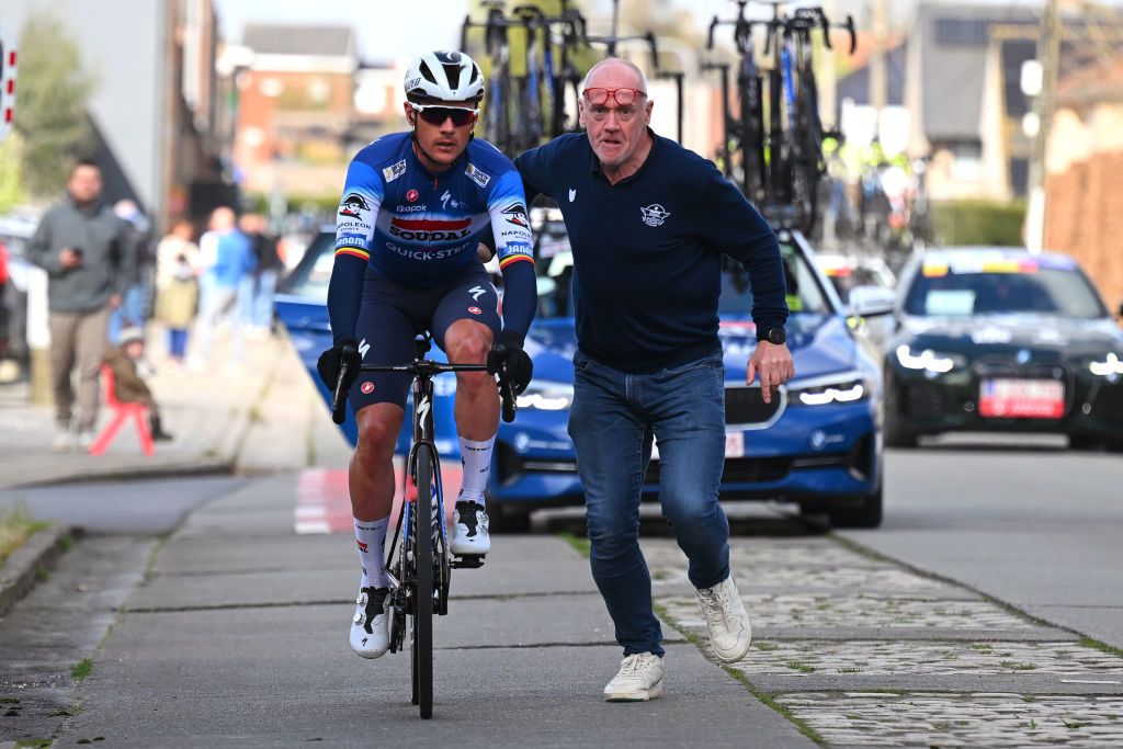 WEVELGEM BELGIUM MARCH 24 Yves Lampaert of Belgium and Team Soudal QuickStep assisted by his sports director Tom Steels of Belgium during the 86th GentWevelgem in Flanders Fields 2024 Mens Elite a 2531km one day race from Ieper to Wevelgem UCIWT on March 24 2024 in Wevelgem Belgium Photo by Tim de WaeleGetty Images
