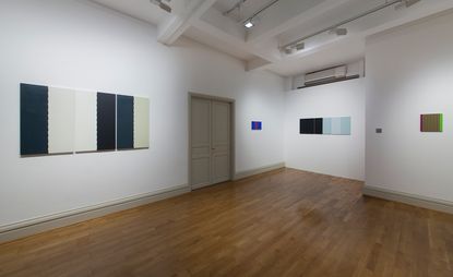 Installation view of new gallery space with wooden flooring