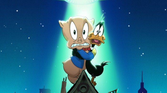 Porky Pig and Daffy Duck clutch each other as they prepare to be abducted by aliens in The Day the Earth Blew Up