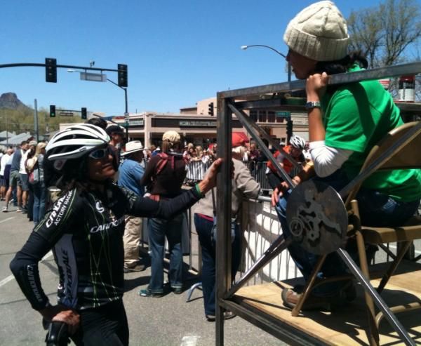 Tinker Juarez talks to the race promoting team to try and work out where he strayed off course. At the time, Juarez was in the lead by about a minute and had only three miles left to finish.