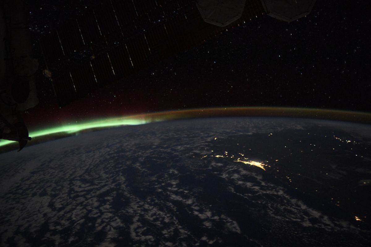 green aurora over earth