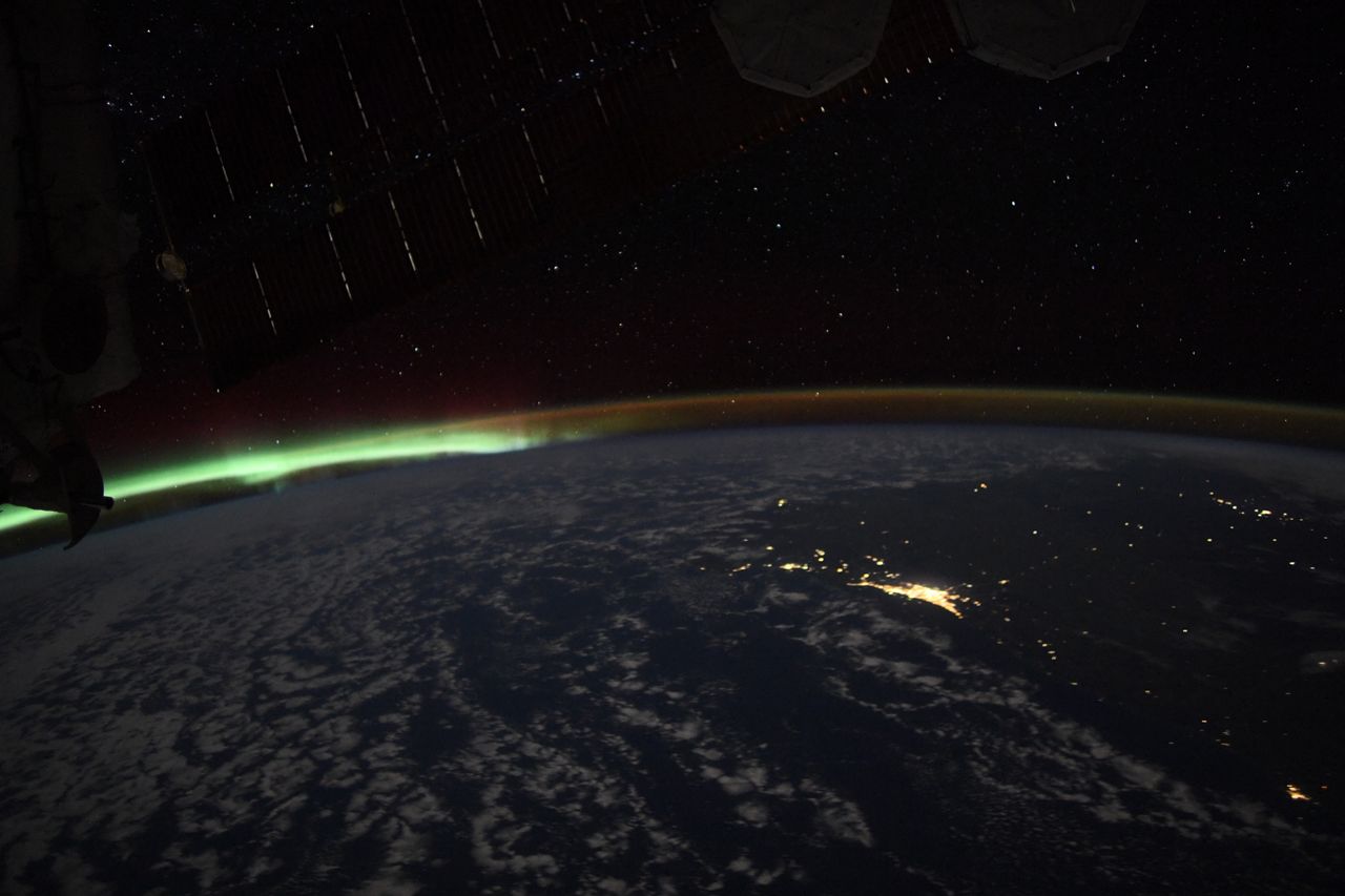 green aurora over earth