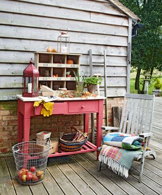 Backyard storage with potting bench and deck