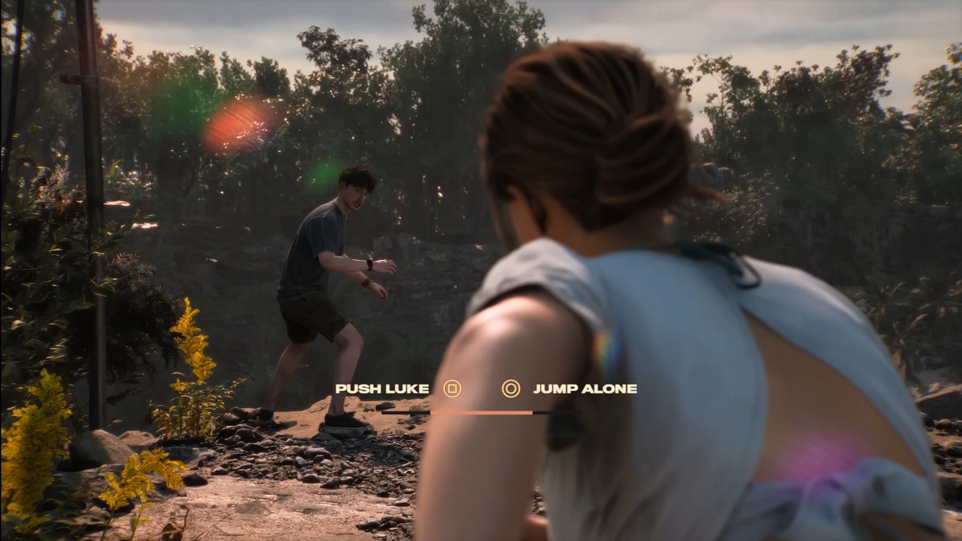 Two characters runs towards a clifftop in Until Dawn 2, with the option to either push Luke down or jump by yourself