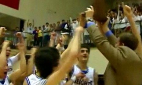 Members of the Alamo Heights high school basketball team celebrate their win against rival Edison: Some students chanted &amp;quot;USA&amp;quot; after beating predominantly Hispanic Edison.