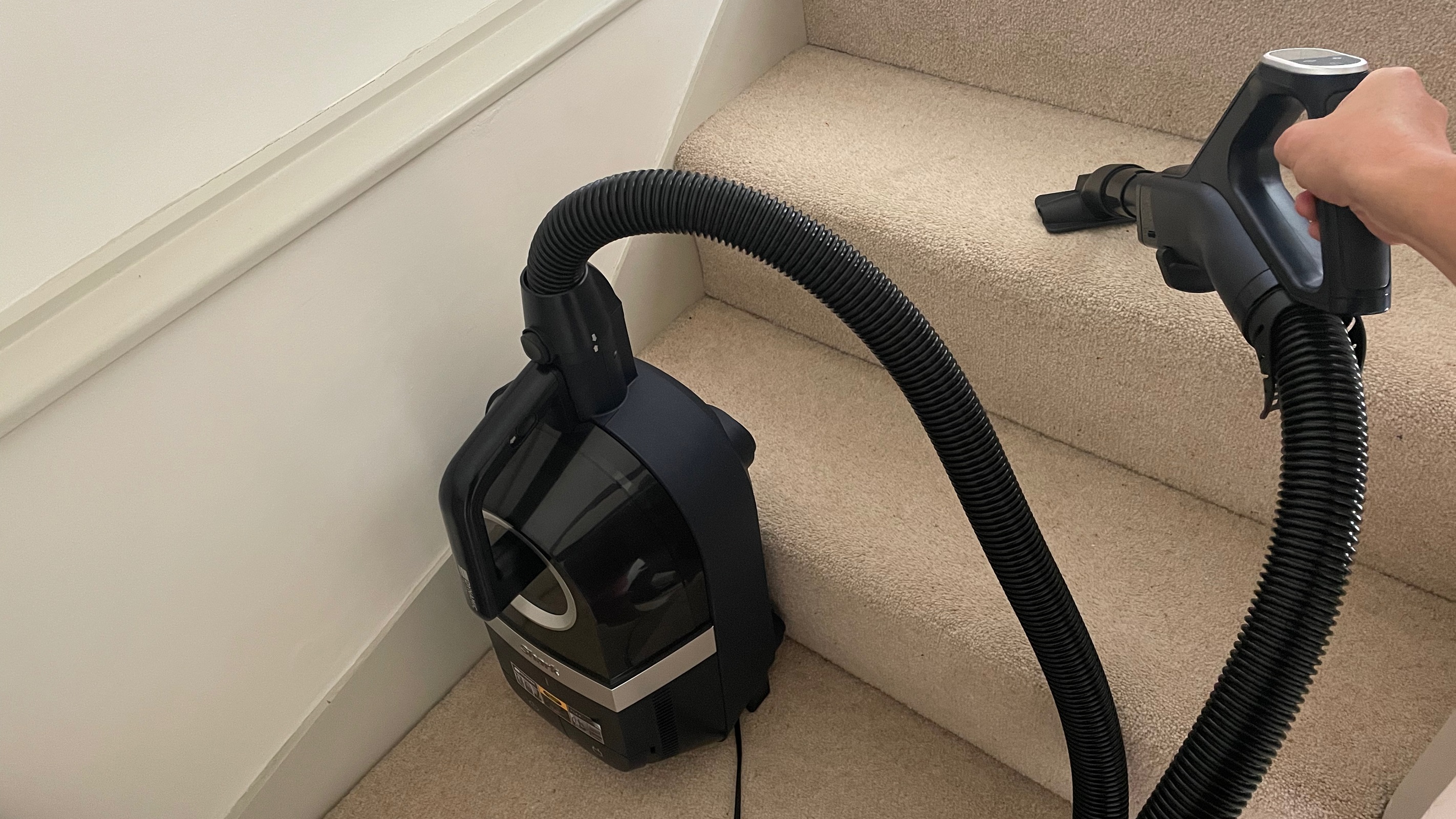 Shark Bagless Cylinder Pet Vacuum CZ250UKT on the stairs