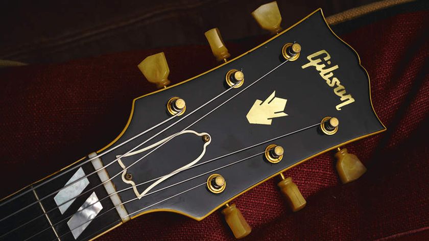 Detail of the headstock on a vintage 1954 Gibson ES-350 electric guitar