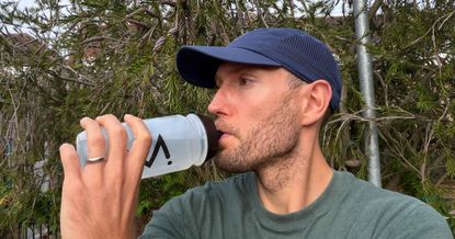 Man drinking Maurten drink