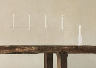 ‘Pilotis’ two-light candelabra; candlestick, both by Barber Osgerby, for Puiforcat. 