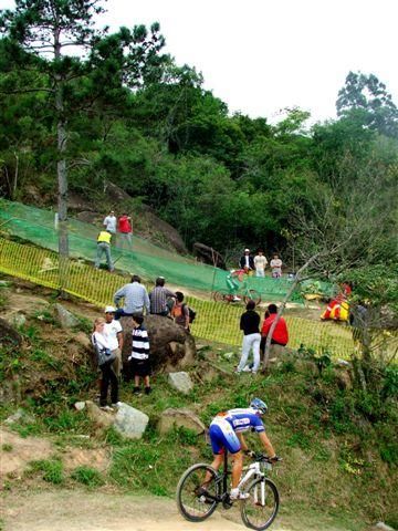 Fans watch a passing racer