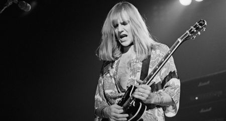 Alex Lifeson of Rush plays his Gibson semi-hollow live in 1976.