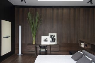 House of Art bedroom with timber wall