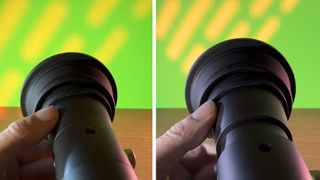 SmallRig RF 10C flashlight held in a hand shining on a greenscreen background