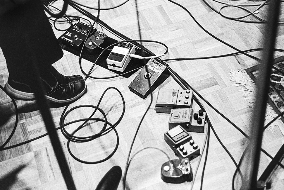 Image of the foot pedals on stage from The Posies in 2004